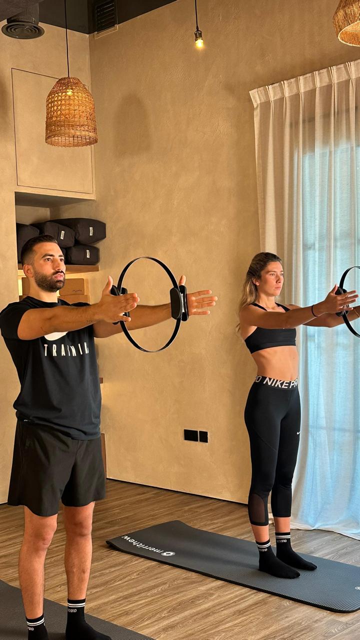 Training with pilates rings at Beyond Fitness